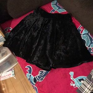 Medium black velvet mini skirt